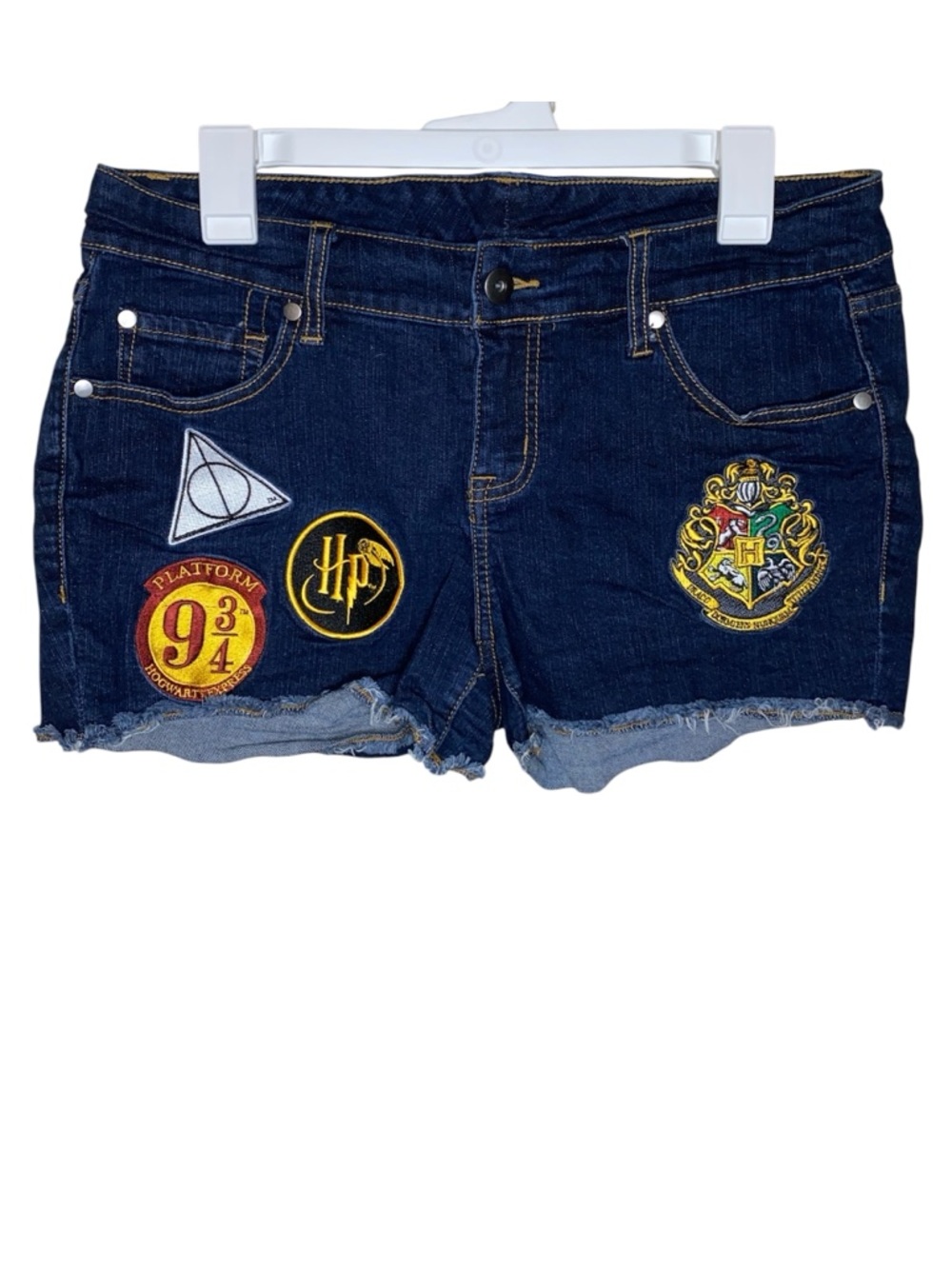 HARRY POTTER Denim Raw Hem Shorts Featuring Embroidered Hogwarts Patches - Picture 2 of 4